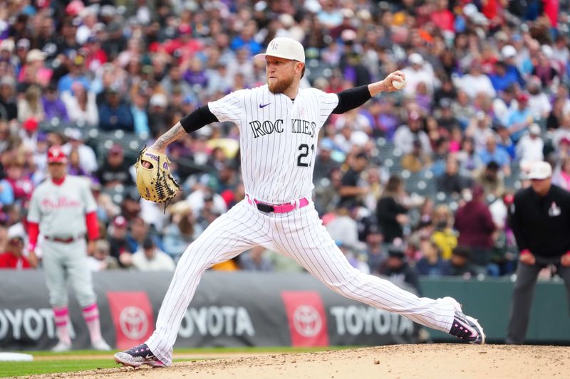 May 14, 2023; Denver, Colorado, USA; Colorado Rockies starting pitcher Kyle Freeland (21) delivers a pitch in the fifth inning against the Philadelphia Phillies at Coors Field. Mandatory Credit: Ron Chenoy-USA TODAY Sports