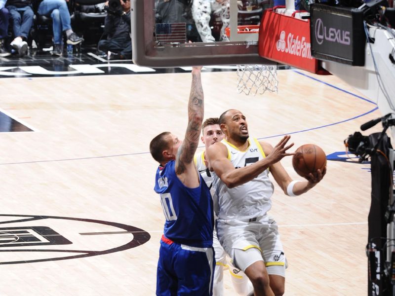 LOS ANGELES, CA - APRIL 5:  Talen Horton-Tucker #5 of the Utah Jazz goes to the basket during the game on April 5, 2024 at Crypto.Com Arena in Los Angeles, California. NOTE TO USER: User expressly acknowledges and agrees that, by downloading and/or using this Photograph, user is consenting to the terms and conditions of the Getty Images License Agreement. Mandatory Copyright Notice: Copyright 2024 NBAE (Photo by Adam Pantozzi/NBAE via Getty Images)