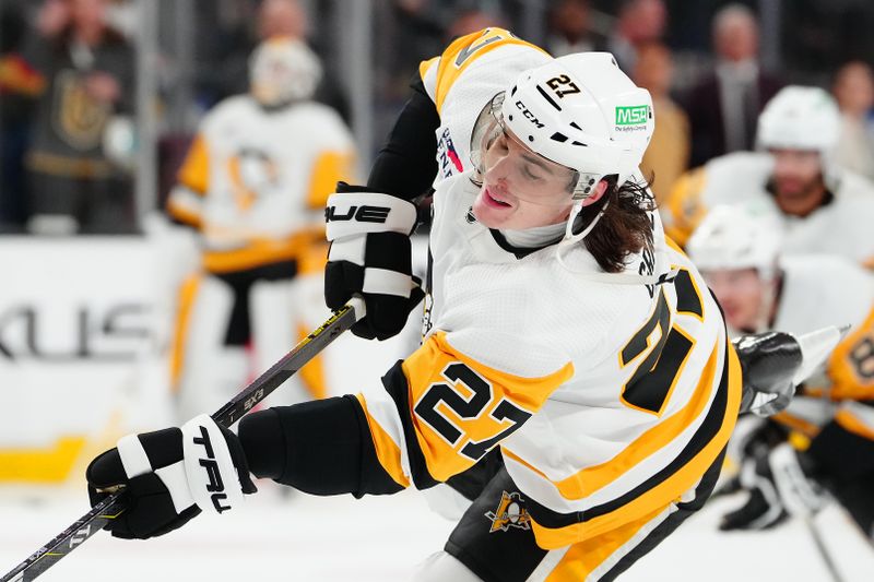 Jan 20, 2024; Las Vegas, Nevada, USA; Pittsburgh Penguins defenseman Ryan Graves (27) warms up before a game against the Vegas Golden Knights at T-Mobile Arena. Mandatory Credit: Stephen R. Sylvanie-USA TODAY Sports