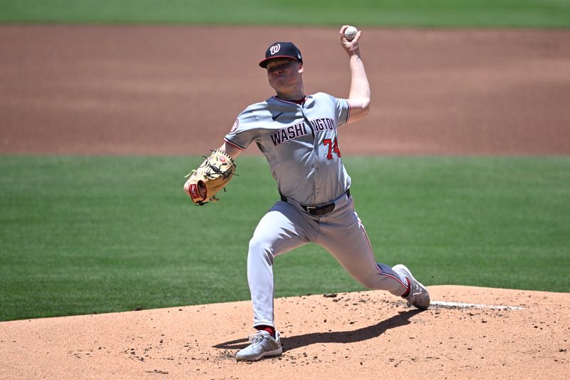 Jun 26, 2024; San Diego, California, USA; Washington Nationals starting pitcher DJ Herz (74) pitches against the San Diego Padres during the first inning at Petco Park. Mandatory Credit: Orlando Ramirez-USA TODAY Sports