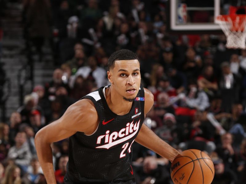 PORTLAND, OR - DECEMBER 6: Kris Murray #24 of the Portland Trail Blazers dribbles the ball during the game against the Utah Jazz on December 6, 2024 at the Moda Center Arena in Portland, Oregon. NOTE TO USER: User expressly acknowledges and agrees that, by downloading and or using this photograph, user is consenting to the terms and conditions of the Getty Images License Agreement. Mandatory Copyright Notice: Copyright 2024 NBAE (Photo by Cameron Browne/NBAE via Getty Images)