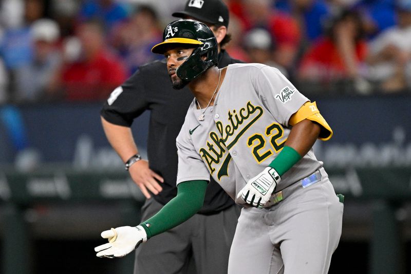 May 1, 2025; Arlington, Texas, USA; Athletics left fielder Miguel Andujar (22) celebrates hitting a single against the Texas Rangers during the eighth inning at Globe Life Field. Mandatory Credit: Jerome Miron-Imagn Images