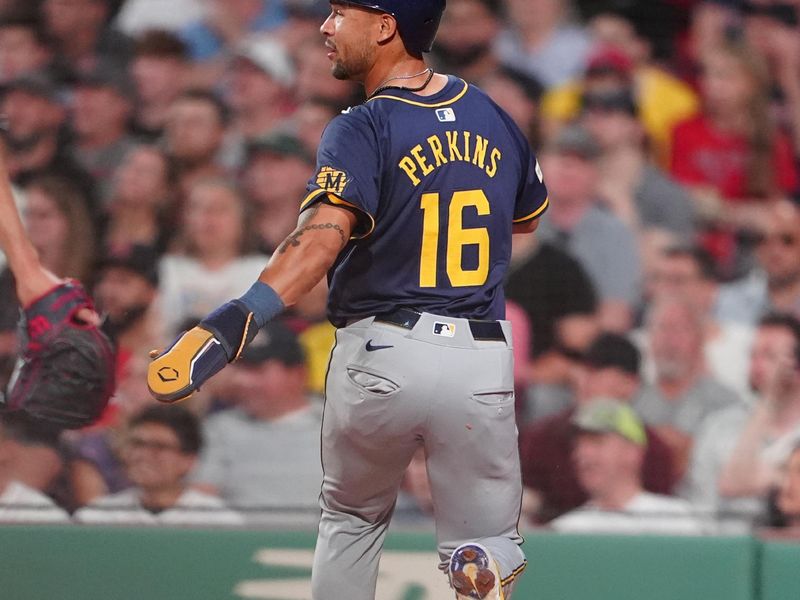 May 24, 2024; Boston, Massachusetts, USA;  Milwaukee Brewers center fielder Blake Perkins (16) scores a run on Milwaukee Brewers designated hitter Christian Yelich (22) RBI double against the Boston Red Sox during the fifth inning at Fenway Park. Mandatory Credit: Gregory Fisher-USA TODAY Sports