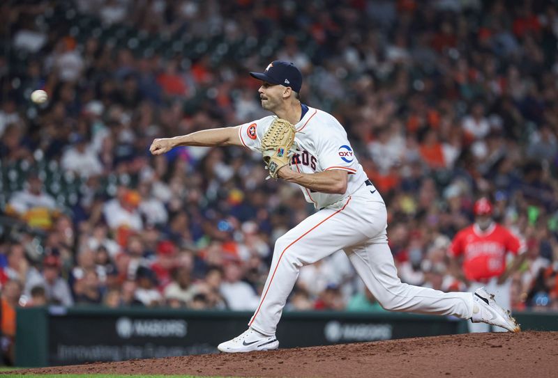 May 21, 2024; Houston, Texas, USA; Houston Astros relief pitcher Tayler Scott (50) delivers a pitch during the fifth inning against the Los Angeles Angels at Minute Maid Park. Mandatory Credit: Troy Taormina-USA TODAY Sports