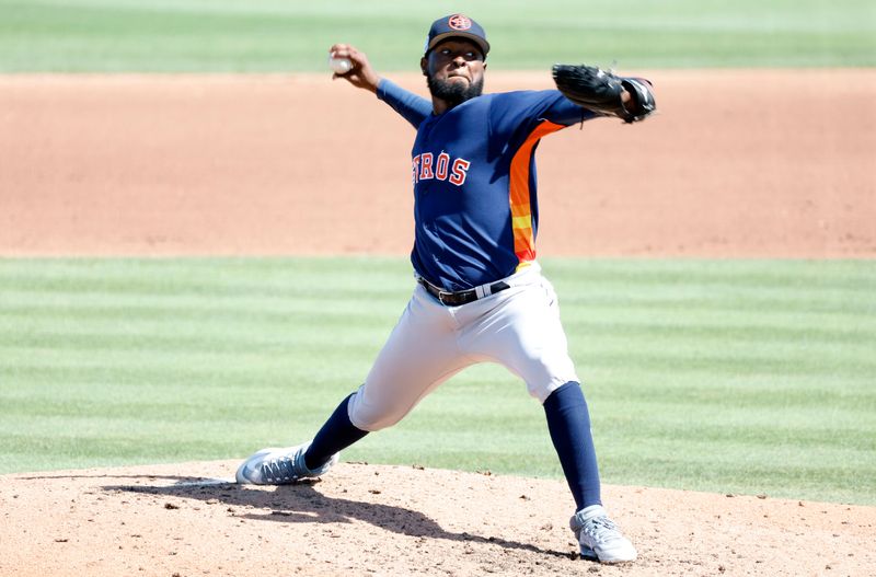 Mar 2, 2023; Jupiter, Florida, USA; Houston Astros pitcher Christian Javier (53) pitches in the fourth inning against the St. Louis Cardinals at Roger Dean Stadium. Mandatory Credit: Rhona Wise-USA TODAY Sports