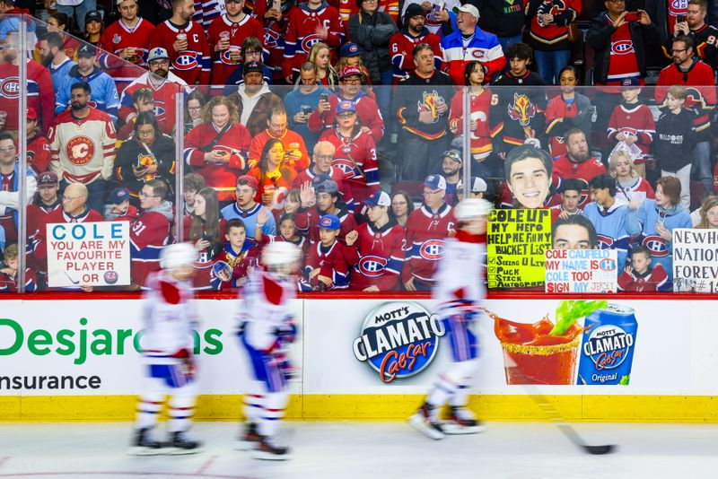 Mar 16, 2024; Calgary, Alberta, CAN; Montreal Canadiens fans during the warmup period against the Calgary Flames at Scotiabank Saddledome. Mandatory Credit: Sergei Belski-USA TODAY Sports