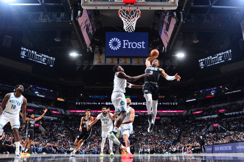 SAN ANTONIO, TX - JANUARY 27: Keldon Johnson #3 of the San Antonio Spurs drives to the basket during the game against the Minnesota Timberwolves on January 27, 2024 at the Frost Bank Center in San Antonio, Texas. NOTE TO USER: User expressly acknowledges and agrees that, by downloading and or using this photograph, user is consenting to the terms and conditions of the Getty Images License Agreement. Mandatory Copyright Notice: Copyright 2024 NBAE (Photos by Michael Gonzales/NBAE via Getty Images)