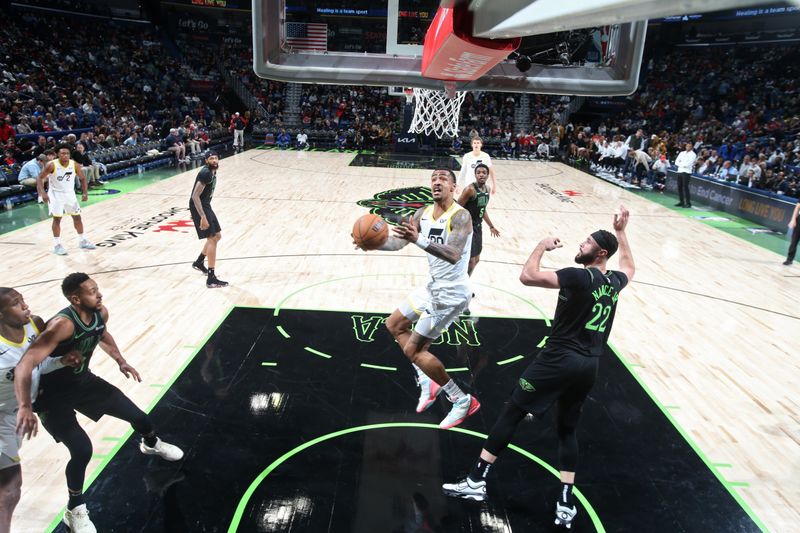 NEW ORLEANS, LA - JANUARY 23: John Collins #20 of the Utah Jazz drives to the basket during the game against the New Orleans Pelicans on January 23, 2024 at the Smoothie King Center in New Orleans, Louisiana. NOTE TO USER: User expressly acknowledges and agrees that, by downloading and or using this Photograph, user is consenting to the terms and conditions of the Getty Images License Agreement. Mandatory Copyright Notice: Copyright 2024 NBAE (Photo by Layne Murdoch Jr./NBAE via Getty Images)