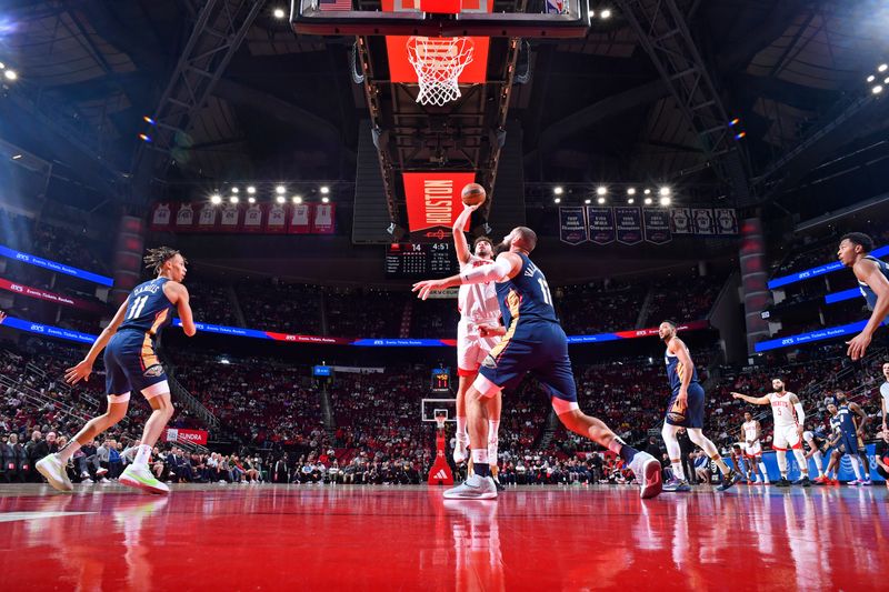 HOUSTON, TX - JANUARY 31:  Alperen Sengun #28 of the Houston Rockets shoots the ball during the game against the New Orleans Pelicans on January 31, 2024 at the Toyota Center in Houston, Texas. NOTE TO USER: User expressly acknowledges and agrees that, by downloading and or using this photograph, User is consenting to the terms and conditions of the Getty Images License Agreement. Mandatory Copyright Notice: Copyright 2024 NBAE (Photo by Logan Riely/NBAE via Getty Images)