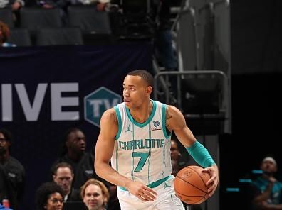 CHARLOTTE, NC - NOVEMBER 22: Bryce McGowans #7 of the Charlotte Hornets dribbles the ball during the game against the Washington Wizards on November 22, 2023 at Spectrum Center in Charlotte, North Carolina. NOTE TO USER: User expressly acknowledges and agrees that, by downloading and or using this photograph, User is consenting to the terms and conditions of the Getty Images License Agreement. Mandatory Copyright Notice: Copyright 2023 NBAE (Photo by Kent Smith/NBAE via Getty Images)