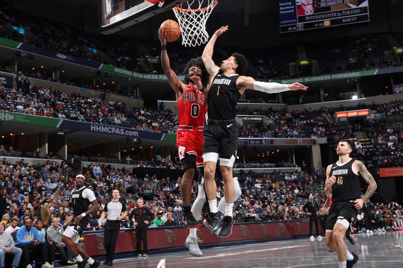 MEMPHIS, TN - FEBRUARY 8: Coby White #0 of the Chicago Bulls drives to the basket during the game against the Memphis Grizzlies on February 8, 2024 at FedExForum in Memphis, Tennessee. NOTE TO USER: User expressly acknowledges and agrees that, by downloading and or using this photograph, User is consenting to the terms and conditions of the Getty Images License Agreement. Mandatory Copyright Notice: Copyright 2024 NBAE (Photo by Joe Murphy/NBAE via Getty Images)