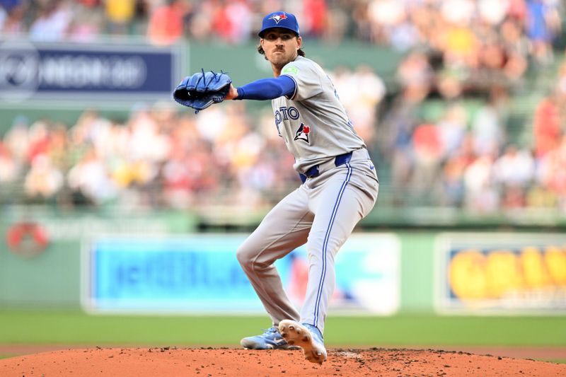 Jun 25, 2024; Boston, Massachusetts, USA; Toronto Blue Jays starting pitcher Kevin Gausman (34) pitches against the Boston Red Sox during the first inning at Fenway Park. Mandatory Credit: Brian Fluharty-USA TODAY Sports