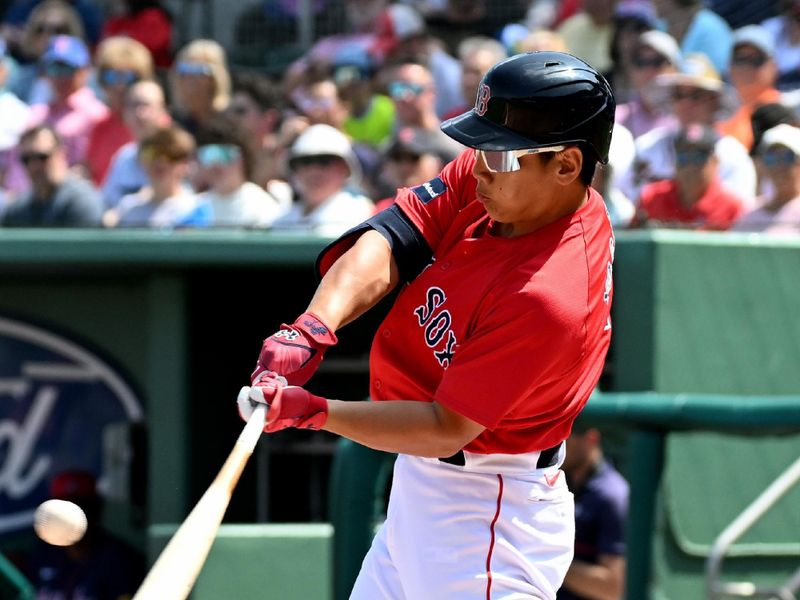 Mar 7, 2024; Fort Myers, Florida, USA; Boston Red Sox left fielder Masataka Yoshida (7) hits a solo home run in the first inning of the spring training game against the Atlanta Braves at JetBlue Park at Fenway South. Mandatory Credit: Jonathan Dyer-USA TODAY Sports