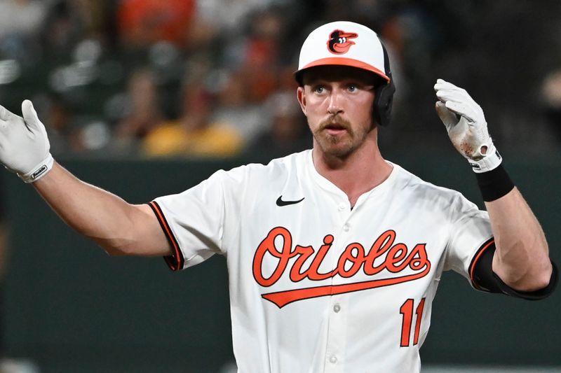 Apr 16, 2024; Baltimore, Maryland, USA;  Baltimore Orioles third baseman Jordan Westburg (11) react after hitting a seventh inning double against the Minnesota Twins at Oriole Park at Camden Yards. Mandatory Credit: Tommy Gilligan-USA TODAY Sports