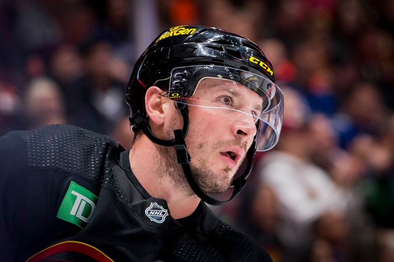 Nov 6, 2023; Vancouver, British Columbia, CAN; Vancouver Canucks forward J.T. Miller (9) looks on against the Edmonton Oilers in the third period at Rogers Arena. Vancouver won 6-2. Mandatory Credit: Bob Frid-USA TODAY Sports