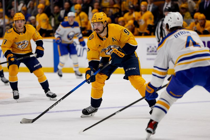Jan 20, 2026; Nashville, Tennessee, USA;  Nashville Predators left wing Filip Forsberg (9) skates with the puck against the Buffalo Sabres during the third period at Bridgestone Arena. Mandatory Credit: Steve Roberts-Imagn Images