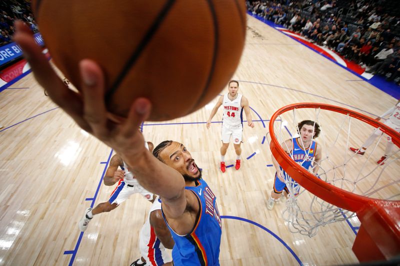 DETROIT, MI - JANUARY 28: Olivier Sarr #30 of the Oklahoma City Thunder drives to the basket during the game against the Detroit Pistons on January 28, 2024 at Little Caesars Arena in Detroit, Michigan. NOTE TO USER: User expressly acknowledges and agrees that, by downloading and/or using this photograph, User is consenting to the terms and conditions of the Getty Images License Agreement. Mandatory Copyright Notice: Copyright 2024 NBAE (Photo by Brian Sevald/NBAE via Getty Images)