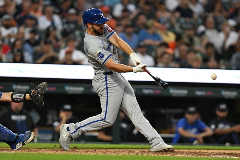 Aug 2, 2024; Detroit, Michigan, USA;  Kansas City Royals third baseman Paul DeJong (15) hits an RBI single against the Detroit Tigers in the seventh inning at Comerica Park.  Mandatory Credit: Lon Horwedel-USA TODAY Sports