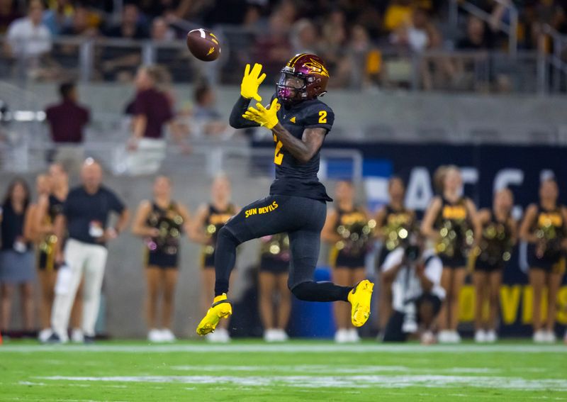 Sep 9, 2023; Tempe, Arizona, USA; Arizona State Sun Devils wide receiver Elijhah Badger (2) catches a pass for a touchdown against the Oklahoma State Cowboys in the first half at Mountain America Stadium. Mandatory Credit: Mark J. Rebilas-USA TODAY Sports