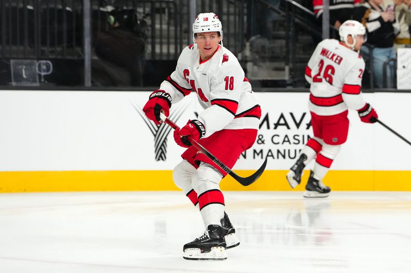 Nov 11, 2024; Las Vegas, Nevada, USA; Carolina Hurricanes center Jack Drury (18) warms up before a game against the Vegas Golden Knights at T-Mobile Arena. Mandatory Credit: Stephen R. Sylvanie-Imagn Images