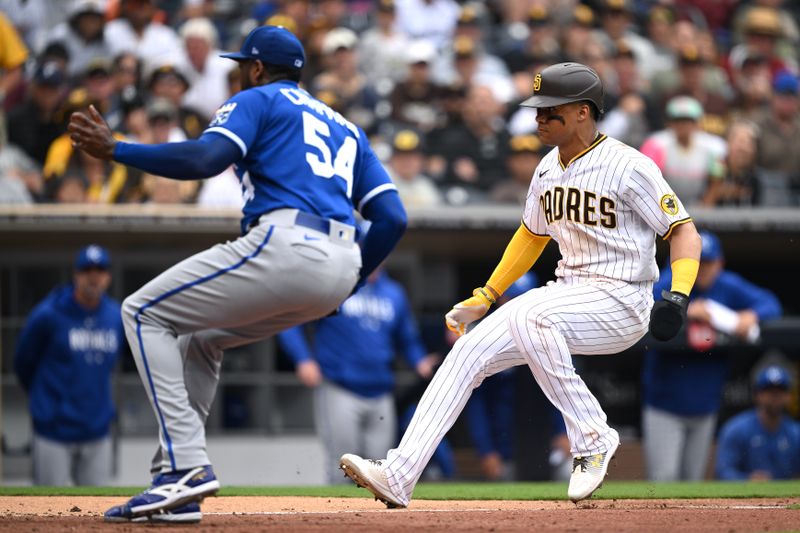 May 17, 2023; San Diego, California, USA; San Diego Padres left fielder Juan Soto (right) stops before being tagged out at home plate during the seventh inning against the Kansas City Royals at Petco Park. Mandatory Credit: Orlando Ramirez-USA TODAY Sports