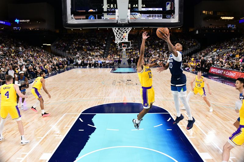 PALM SPRINGS, CA - OCTOBER 4: Terrence Shannon #00 of the Minnesota Timberwolves drives to the basket during the game against the Los Angeles Lakers during an NBA preseason game on October 4, 2024 at Acrisure Arena in Palm Springs, California. NOTE TO USER: User expressly acknowledges and agrees that, by downloading and/or using this Photograph, user is consenting to the terms and conditions of the Getty Images License Agreement. Mandatory Copyright Notice: Copyright 2024 NBAE (Photo by Adam Pantozzi/NBAE via Getty Images)