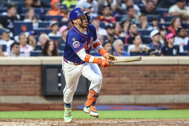 Jun 26, 2024; New York City, New York, USA;  New York Mets catcher Francisco Alvarez (4) hits a two run home run in the third inning against the New York Yankees at Citi Field. Mandatory Credit: Wendell Cruz-USA TODAY Sports