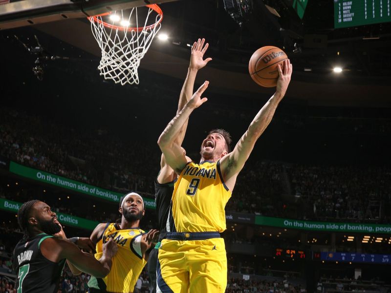 BOSTON, MA - MAY 23: T.J. McConnell #9 of the Indiana Pacers drives to the basket during the game against the Boston Celtics during Game 2 of the Eastern Conference Finals of the 2024 NBA Playoffs on May 23, 2024 at the TD Garden in Boston, Massachusetts. NOTE TO USER: User expressly acknowledges and agrees that, by downloading and or using this photograph, User is consenting to the terms and conditions of the Getty Images License Agreement. Mandatory Copyright Notice: Copyright 2024 NBAE  (Photo by Nathaniel S. Butler/NBAE via Getty Images)