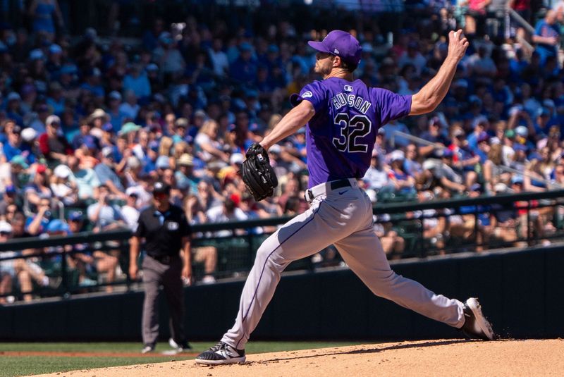 Mar 9, 2024; Mesa, Arizona, USA; Colorado Rockies starting pitcher Dakota Hudson (32) throws against the Chicago Cubs in the first inning during a spring training game between at Sloan Park. Mandatory Credit: Allan Henry-USA TODAY Sports