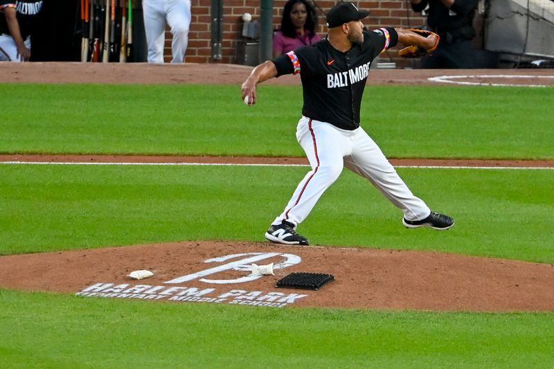 May 31, 2024; Baltimore, Maryland, USA;  Baltimore Orioles pitcher Albert Suárez (49) throws a third inning pitch against the Tampa Bay Rays at Oriole Park at Camden Yards. Mandatory Credit: Tommy Gilligan-USA TODAY Sports