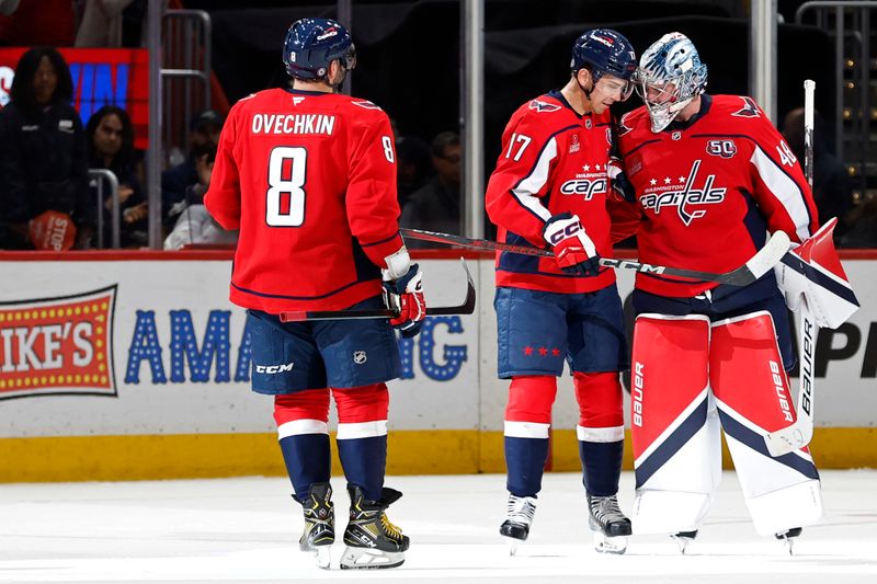 Nov 2, 2024; Washington, District of Columbia, USA; Washington Capitals goaltender Logan Thompson (48) celebrates with Capitals center Dylan Strome (17) and Capitals left wing Alex Ovechkin (8) after their game against the Columbus Blue Jackets at Capital One Arena. Mandatory Credit: Geoff Burke-Imagn Images