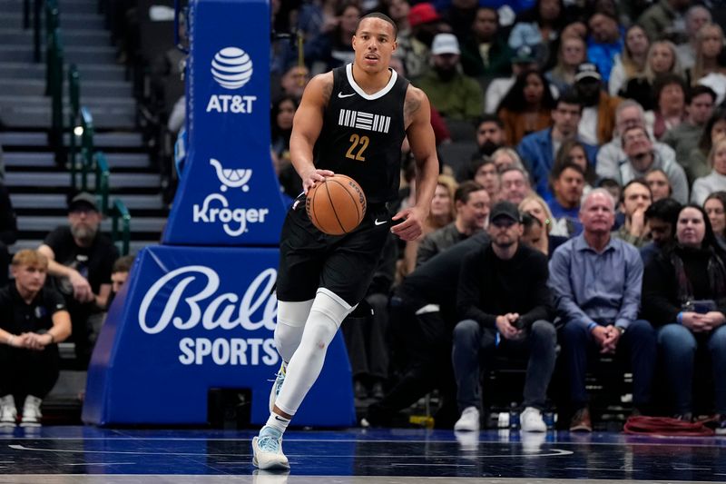 DALLAS, TEXAS - JANUARY 09: Desmond Bane #22 of the Memphis Grizzlies brings the ball up court during the second half against the Dallas Mavericks at American Airlines Center on January 09, 2024 in Dallas, Texas. NOTE TO USER: User expressly acknowledges and agrees that, by downloading and or using this photograph, User is consenting to the terms and conditions of the Getty Images License Agreement. (Photo by Sam Hodde/Getty Images)