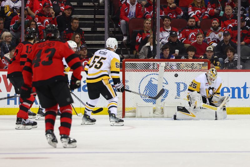 Mar 19, 2024; Newark, New Jersey, USA; New Jersey Devils right wing Timo Meier (28) (not shown) scores a goal against the Pittsburgh Penguins during the third period at Prudential Center. Mandatory Credit: Ed Mulholland-USA TODAY Sports