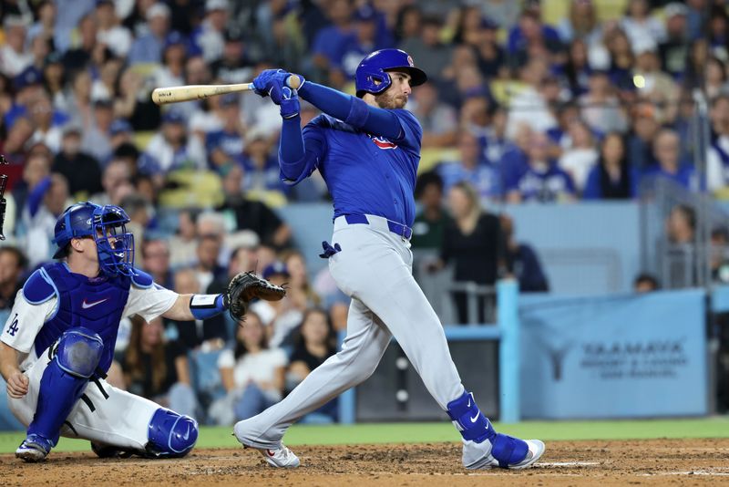 Sep 11, 2024; Los Angeles, California, USA;  Chicago Cubs right fielder Cody Bellinger (24) hits a 3-run home run during the fifth inning against the Los Angeles Dodgers at Dodger Stadium. Mandatory Credit: Kiyoshi Mio-Imagn Images