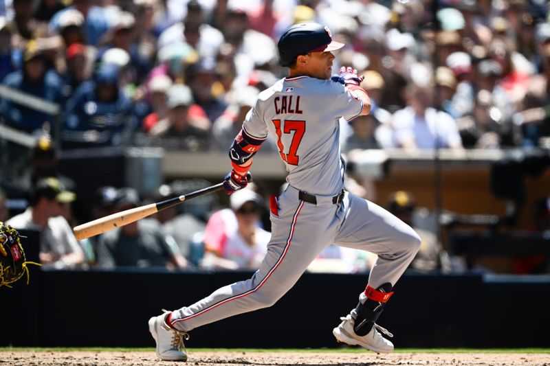Jun 25, 2025; San Diego, California, USA; Washington Nationals left fielder Alex Call (17) hits a single during the fifth inning against the San Diego Padres at Petco Park. Mandatory Credit: Denis Poroy-Imagn Images