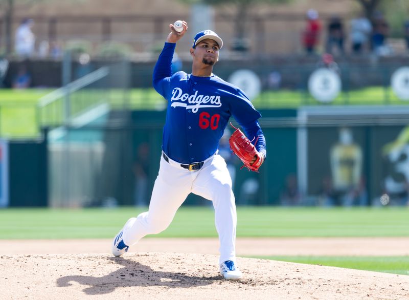 Feb 24, 2026; Phoenix, Arizona, USA; Los Angeles Dodgers pitcher Edgardo Henriquez against the Cleveland Guardians during a spring training game at Camelback Ranch-Glendale. Mandatory Credit: Mark J. Rebilas-Imagn Images
