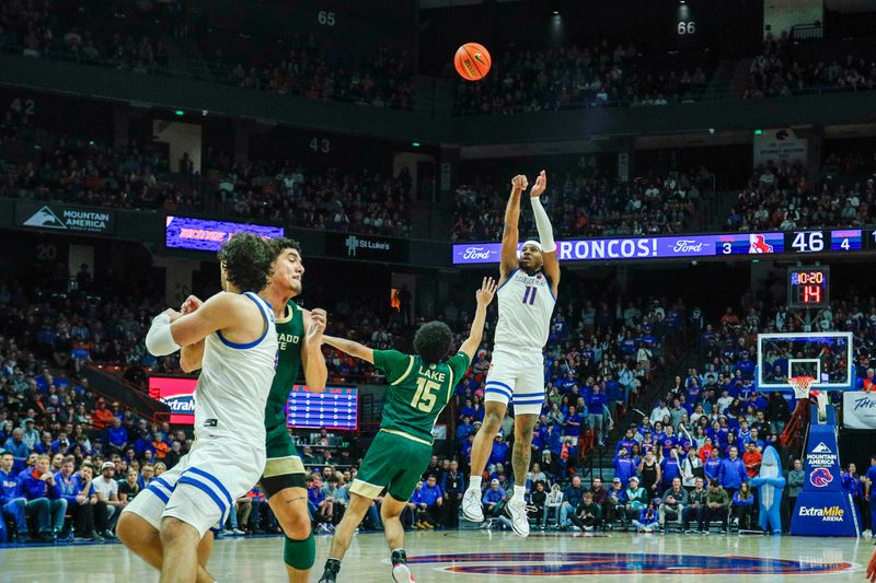 Jan 9, 2024; Boise, Idaho, USA; Boise State Broncos guard Chibuzo Agbo (11) shoots the ball during the second half against the Colorado State Rams at ExtraMile Arena. Mandatory Credit: Brian Losness-USA TODAY Sports