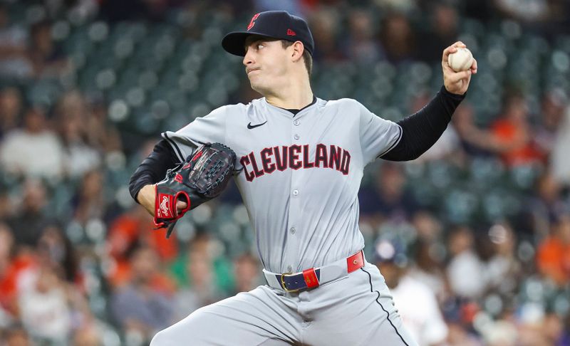 May 2, 2024; Houston, Texas, USA; Cleveland Guardians starting pitcher Logan Allen (41) delivers a pitch during the first inning against the Houston Astros at Minute Maid Park. Mandatory Credit: Troy Taormina-USA TODAY Sports