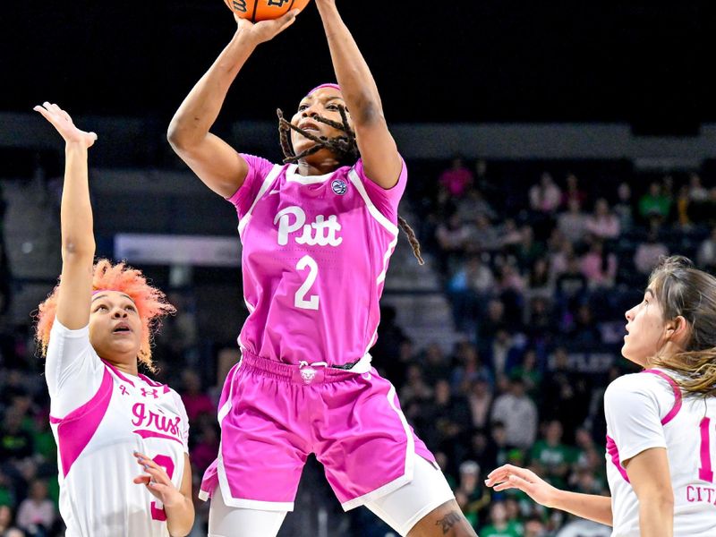 Feb 4, 2024; South Bend, Indiana, USA; Pittsburgh Panthers forward Liatu King (2) shoots as Notre Dame Fighting Irish guard Hannah Hidalgo (3) defends in the first half at the Purcell Pavilion. Mandatory Credit: Matt Cashore-USA TODAY Sports