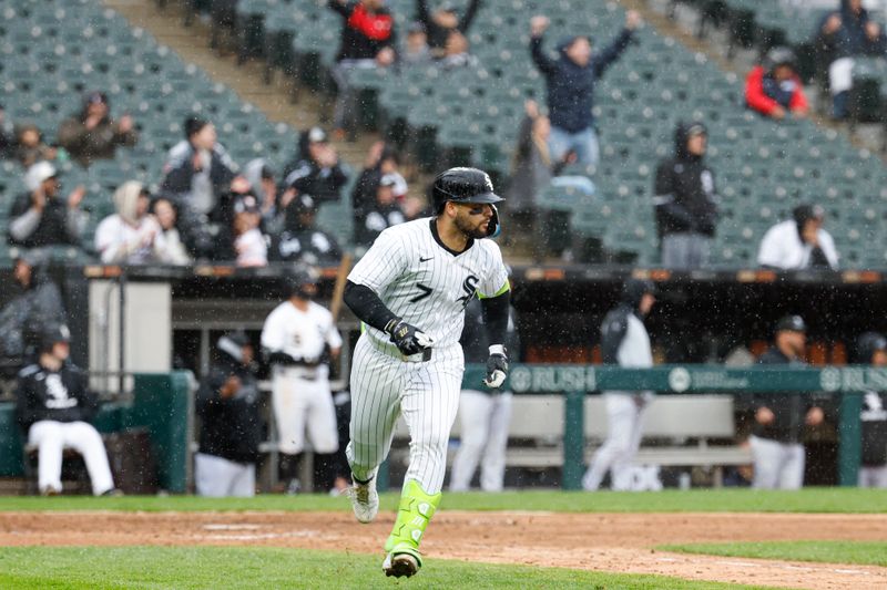 May 4, 2025; Chicago, Illinois, USA; Chicago White Sox catcher Edgar Quero (7) runs to first base after hitting an RBI-single against the Houston Astros during the sixth inning at Rate Field. Mandatory Credit: Kamil Krzaczynski-Imagn Images