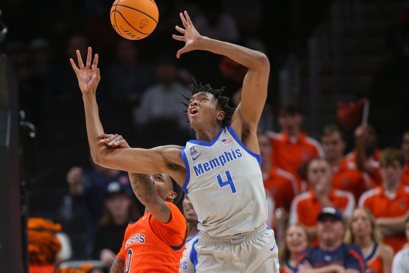 Dec 10, 2022; Atlanta, Georgia, USA; Memphis Tigers forward Chandler Lawson (4) reaches for a loose ball with Auburn Tigers guard K.D. Johnson (0) in the first half at State Farm Arena. Mandatory Credit: Brett Davis-USA TODAY Sports
