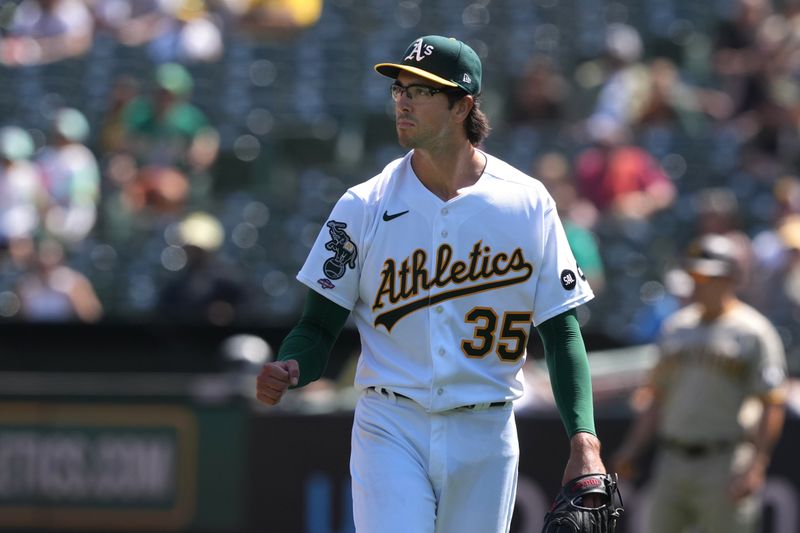 Sep 17, 2023; Oakland, California, USA; Oakland Athletics starting pitcher Joe Boyle (35) reacts after the last out of the top of the first inning against the San Diego Padres at Oakland-Alameda County Coliseum. Mandatory Credit: Darren Yamashita-USA TODAY Sports