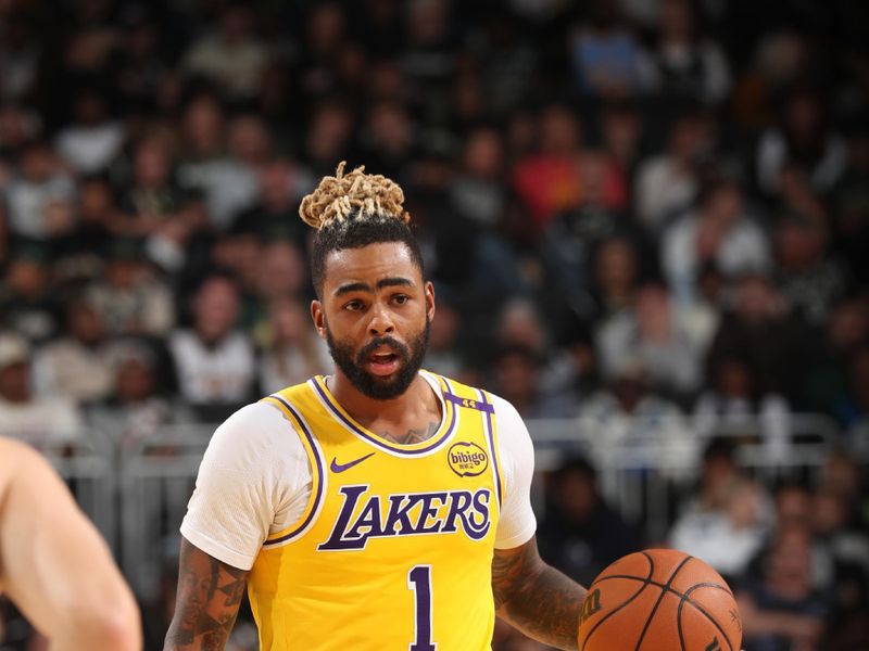 MILWAUKEE, WI - OCTOBER 10: D'Angelo Russell #1 of the Los Angeles Lakers handles the ball during the game against the Milwaukee Bucks during a preseason game on October 10, 2024 at Fiserv Forum Center in Milwaukee, Wisconsin. NOTE TO USER: User expressly acknowledges and agrees that, by downloading and or using this Photograph, user is consenting to the terms and conditions of the Getty Images License Agreement. Mandatory Copyright Notice: Copyright 2024 NBAE (Photo by Gary Dineen/NBAE via Getty Images).