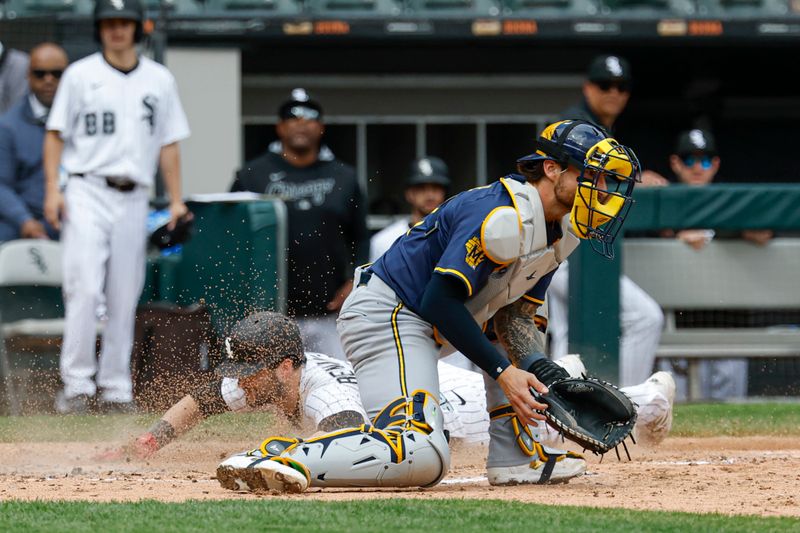 May 1, 2025; Chicago, Illinois, USA; Chicago White Sox designated hitter Andrew Benintendi (23) scores against the Milwaukee Brewers during the seventh inning at Rate Field. Mandatory Credit: Kamil Krzaczynski-Imagn Images