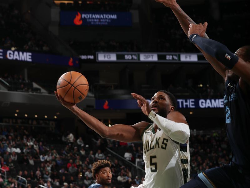 MILWAUKEE, WI - OCTOBER 20: Malik Beasley #5 of the Milwaukee Bucks shoots the ball during the preseason game on October 20, 2023 at the Fiserv Forum Center in Milwaukee, Wisconsin. NOTE TO USER: User expressly acknowledges and agrees that, by downloading and or using this Photograph, user is consenting to the terms and conditions of the Getty Images License Agreement. Mandatory Copyright Notice: Copyright 2023 NBAE (Photo by Gary Dineen/NBAE via Getty Images).