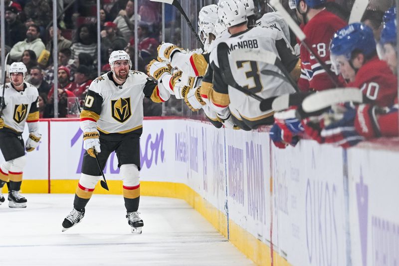 Nov 23, 2024; Montreal, Quebec, CAN; Las Vegas Golden Knights left wing Tanner Pearson (70) celebrates his goal against the Montreal Canadiens with his teammates at the bench during the second period at Bell Centre. Mandatory Credit: David Kirouac-Imagn Images