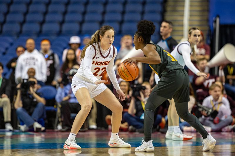 Mar 8, 2024; Greensboro, NC, USA; Virginia Tech Hokies guard Cayla King (22) defends Miami Hurricanes guard Shayeann Day-Wilson (30) in the first half at Greensboro Coliseum. Mandatory Credit: David Yeazell-USA TODAY Sports