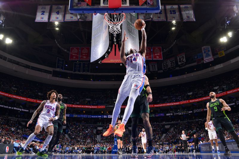 PHILADELPHIA, PA - FEBRUARY 2: Ricky Council IV #14 of the Philadelphia 76ers drives to the basket during the game against the Boston Celtics on February 2, 2025 at the Wells Fargo Center in Philadelphia, Pennsylvania NOTE TO USER: User expressly acknowledges and agrees that, by downloading and/or using this Photograph, user is consenting to the terms and conditions of the Getty Images License Agreement. Mandatory Copyright Notice: Copyright 2025 NBAE(Photo by Jesse D. Garrabrant/NBAE via Getty Images)