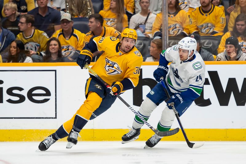 Apr 28, 2024; Nashville, Tennessee, USA; Nashville Predators left wing Cole Smith (36) skates against the Vancouver Canucks during the first period n game four of the first round of the 2024 Stanley Cup Playoffs at Bridgestone Arena. Mandatory Credit: Steve Roberts-USA TODAY Sports