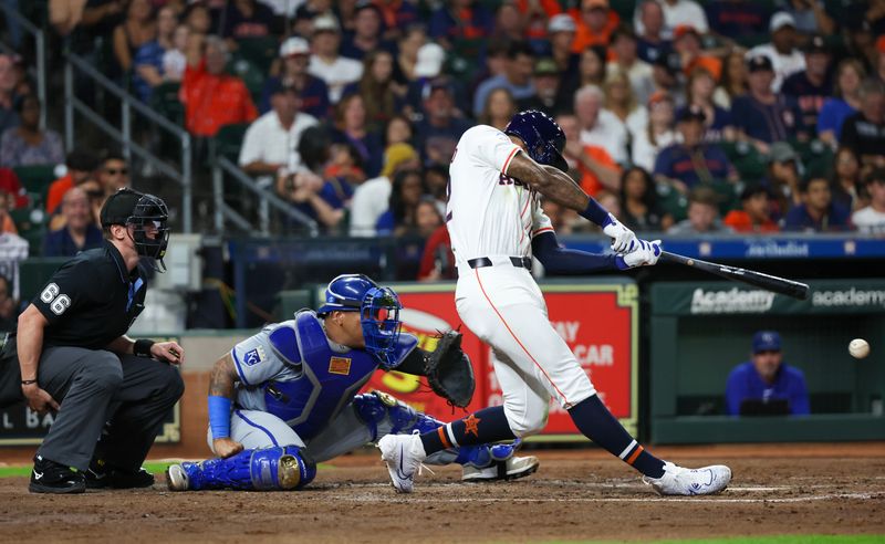 Aug 29, 2024; Houston, Texas, USA;  Houston Astros right fielder Jason Hayward (22) hits a two run RBI double against the Kansas City Royals in the fifth inning at Minute Maid Park. Mandatory Credit: Thomas Shea-USA TODAY Sports